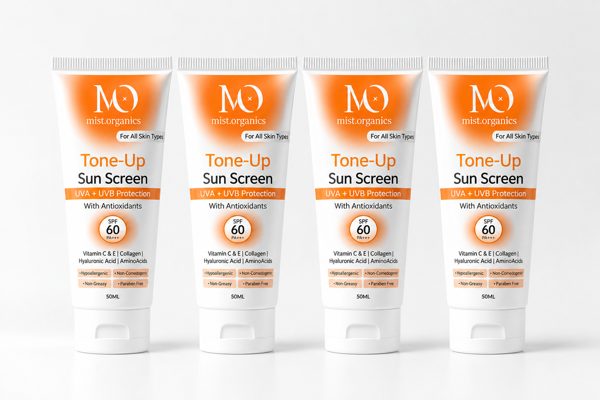 Four MistOrganics Tone Up Sunscreen SPF 60 PA+++ tubes lined up side by side