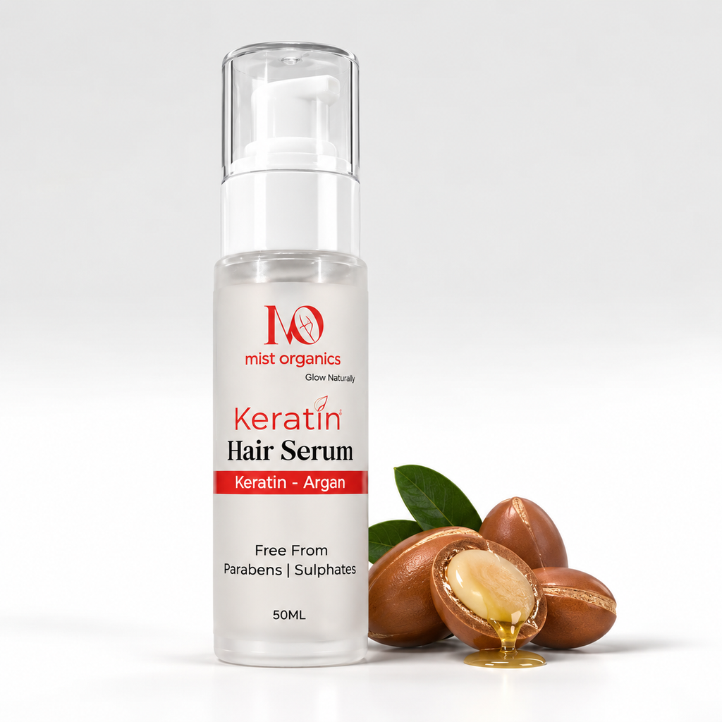 Mist Organics KeraMist Keratin Hair Serum 50ml pump bottle beside argan nuts
