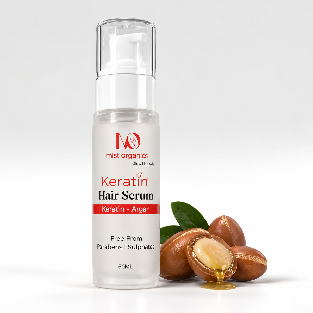 Mist Organics KeraMist Keratin Hair Serum 50ml pump bottle beside argan nuts