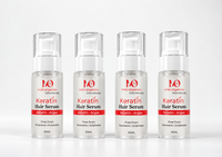 Four bottles of MistOrganics KeraMist Keratin Hair Serum 50ml lined up
